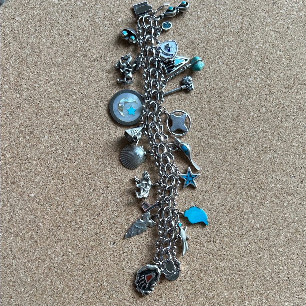 NAVAJO STERLING SILVER
CHARM BRACELET 7.5" TURQUOISE WITH 20ster/turq/etc charms